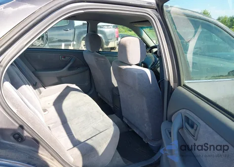 1998 Toyota Camry Le z USA, uszkodzony, nr VIN JT2BG22K9W0215442